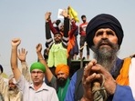 Farmers celebrate at Delhi’s Singhu border protest site after PM Narendra Modi announced that the three contentious farm laws will be repealed.(HT Photo/Sanchit Khanna) Farmers celebrate at Delhi’s Singhu border protest site after PM Narendra Modi announced that the three contentious farm laws will be repealed.(HT Photo/Sanchit Khanna)