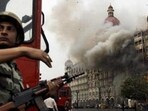 Smoke is seen billowing out of the ground and first floor of the Taj Hotel in south Mumbai during security personnel's Operation Cyclone following the 26/11 terror attacks in 2008. (File photo)