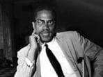 Malcolm X speaks at a news conference in the Hotel Theresa, in New York, on May 21, 1964. (AP Photo, File)