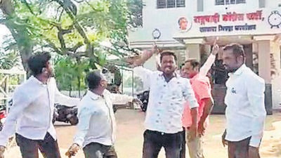 Angry supporters of NCP legislator Shashikant Shinde hurled stones at the party office in Satara, after Shinde lost a poll for the post of director on the board of the Satara coop bank, results for which were declared on Tuesday. (HT PHOTO)