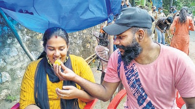 Anupama Chandran and her husband K Ajith celebrate in front of Kerala State Council for Child Welfare in Thiruvananthapuram after receiving news about the DNA test results confirming them as the parents of the baby given up for adoption (Agencies)