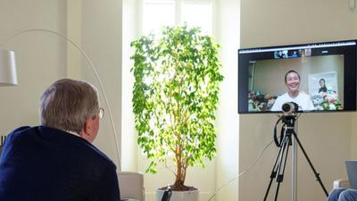 Chinese tennis player Peng Shuai seen on screen during a virtual discussion with International Olympic Committee (IOC) President Thomas Bach in Lausanne, Switzerland. (REUTERS)