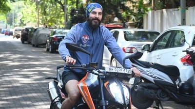 Dino Morea smiled for the lens as he was spotted on his bike in Bandra. (Varinder Chawla) 