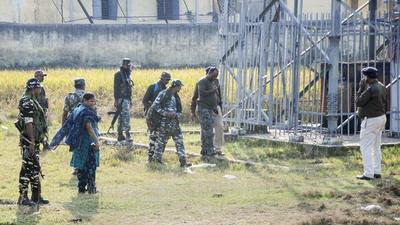 Security forces during a search operation after Panchayat Bhawan was blown up in a blast, allegedly by Maoists, in Aurangabad district on Tuesday. (PTI) Security forces during a search operation after Panchayat Bhawan was blown up in a blast, allegedly by Maoists, in Aurangabad district on Tuesday. (PTI)