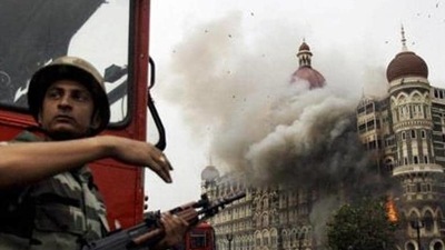 Smoke is seen billowing out of the ground and first floor of the Taj Hotel in south Mumbai during security personnel's Operation Cyclone following the 26/11 terror attacks in 2008. (File photo) Smoke is seen billowing out of the ground and first floor of the Taj Hotel in south Mumbai during security personnel's Operation Cyclone following the 26/11 terror attacks in 2008. (File photo)