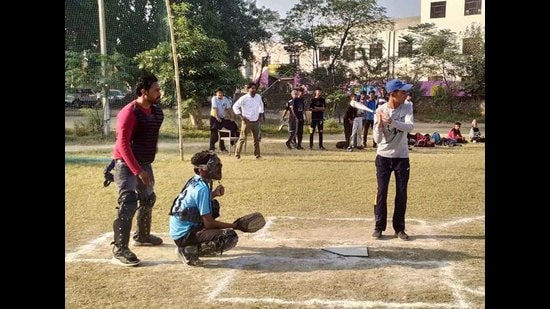 Players in action during the 8th Sub-junior Punjab State Baseball Championship being played at Government Girls Senior Secondary School in Gill village, Ludhiana, on Tuesday. (HT Photo)