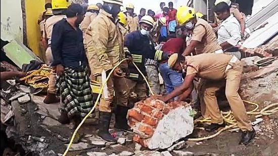 Rescue operation underway after four houses collapsed due to heavy rainfall at Karungalpatti, in Salem on Tuesday. (ANI)