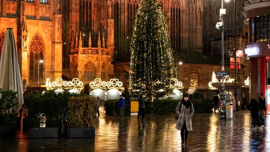The closed 'Christkindlmarkt' Vienna's Christmas Market and St Stephen's Cathedral Austria during the ongoing Covid-19 pandemic.(AFP)
