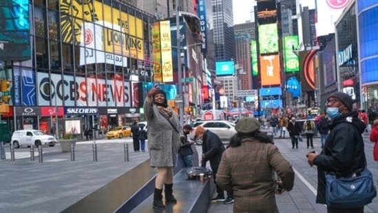 New York's Times Square is witnessing a strong tourism rebound but the foot traffic into souvenir shops, restaurants, hotels is still not what it was before the coronavirus pandemic.(AP)