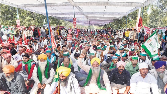 Farmers at the Samyukt Kisan Morcha mahapanchayat, in Lucknow, on Monday. The Cabinet is likely to approve a draft bill on Wednesday to set in motion a legislative process to repeal three contentious farm laws.
