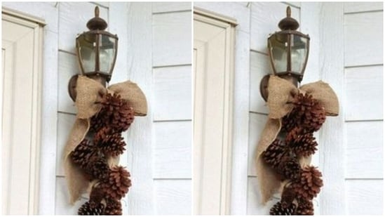 With pine cones and a rug shaped to form a bow, deck up your home's entrance.(https://in.pinterest.com/)