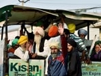 Farmers sitting on a tractor shout slogans during celebrations at Singhu Border, in New Delhi on Saturday. (File Photo) Farmers sitting on a tractor shout slogans during celebrations at Singhu Border, in New Delhi on Saturday. (File Photo)