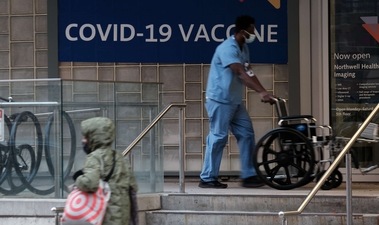 A sign outside of a hospital advertises the COVID-19 vaccine on November 19, 2021 in New York City (AFP)
