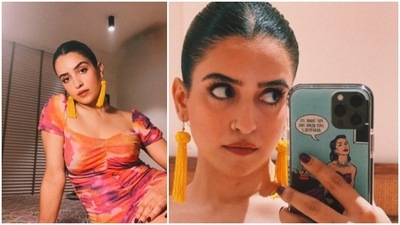 Sanya Malhotra teamed her look with a pair of long yellow thread tassel earrings. (Instagram/@sanyamalhotra_) Sanya Malhotra teamed her look with a pair of long yellow thread tassel earrings. (Instagram/@sanyamalhotra_)