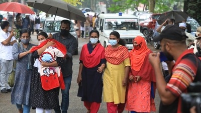 Anupama and Ajith seen with their child outside the courthouse (Vivek Nair/HT photos) Anupama and Ajith seen with their child outside the courthouse (Vivek Nair/HT photos)