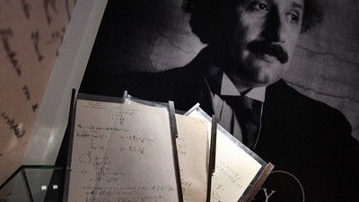 A picture taken on November 22, 2021, shows pages of one of the preparatory manuscripts to the theory of general relativity of Albert Einstein. (File Photo / AFP) A picture taken on November 22, 2021, shows pages of one of the preparatory manuscripts to the theory of general relativity of Albert Einstein. (File Photo / AFP)