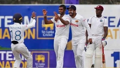 Sri Lankan bowler Lasith Embuldeniya second left, celebrates the dismissal of West Indies batsman Jermaine Blackwood with team mates during the fourth day of the first test cricket match between Sri Lanka and West Indies in Galle, Sri Lanka, Wednesday, Nov. 24, 2021. (AP) Sri Lankan bowler Lasith Embuldeniya second left, celebrates the dismissal of West Indies batsman Jermaine Blackwood with team mates during the fourth day of the first test cricket match between Sri Lanka and West Indies in Galle, Sri Lanka, Wednesday, Nov. 24, 2021. (AP)