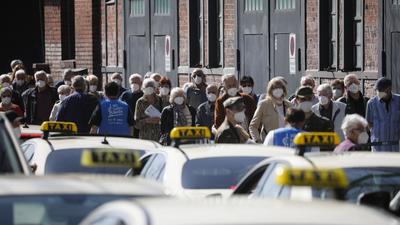 People line up in front of the vaccination centre at the Arena Treptow in Berlin, Germany, on March 31. (AP) People line up in front of the vaccination centre at the Arena Treptow in Berlin, Germany, on March 31. (AP)