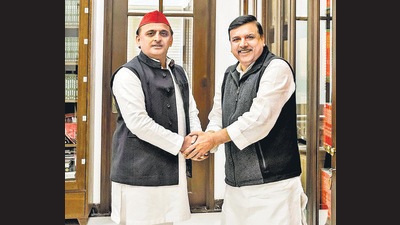 SP chief Akhilesh Yadav meets AAP’s Sanjay Singh in Lucknow, on Wednesday. (PTI) SP chief Akhilesh Yadav meets AAP’s Sanjay Singh in Lucknow, on Wednesday. (PTI)