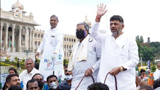 In a conversation caught on camera, senior Congress leader Siddaramaiah is heard informing Karnataka Congress chief DK Shivakumar about Sardar Patel’s birth anniversary and suggesting a photo be placed next to Indira Gandhi during an event in Bengaluru. (ANI)