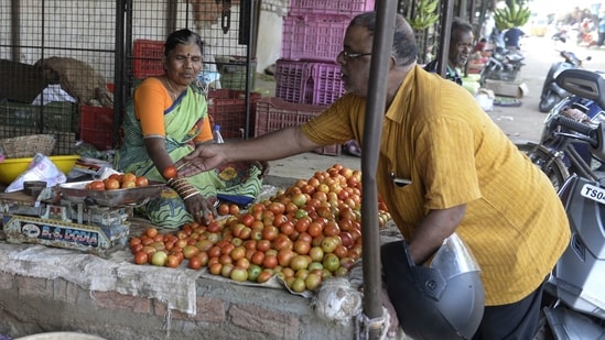 Vegetable prices have seen a surge in the Delhi-NCR region, Karnataka, Kerala and several other parts due to heavy rainfall and crop failure. Vendors in Okhla fruit and vegetable market said that the customers are now hesitating to buy vegetables.(AFP)