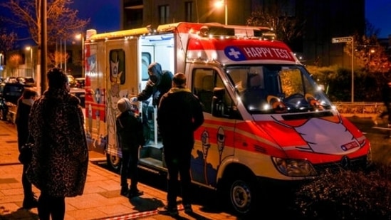 A medical worker carries out a rapid test in a test mobile in Frankfurt(AP Photo) A medical worker carries out a rapid test in a test mobile in Frankfurt(AP Photo)