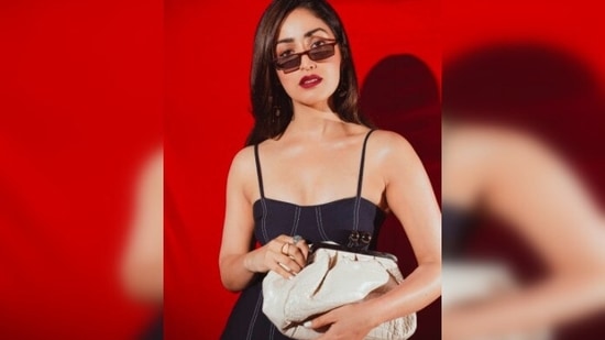 Sharing her photos wearing the dress on her Instagram handle, Yami Gautam captioned her post, "Painting the town red but in blue.."(Instagram/@yamigautam)
