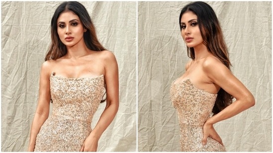 Actor Mouni Roy attended the International Film Festival of India (IFFI) in Goa recently. She brought the glamour and shine on the red carpet wearing a stunning embellished dress. Taking to Instagram today, Mouni shared several photos of herself dressed in the gown. And we are floored by her sartorial sense, to say the least.(Instagram/@imouniroy)