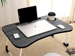 Laptop tables can be used in several ways. Laptop tables can be used in several ways.