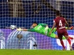 Subhasish Roy Chowdhury, goalkeeper of NorthEast United FC, dives to defend a goal.(PTI)
