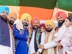 Punjab CM Charanjit Singh Channi and state Congress president Navjot Singh Sidhu inducting Raikot MLA Jagtar Singh Jagga into the party on Thursday.