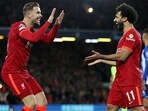 Mohamed Salah of Liverpool celebrates after scoring the team's second goal with Jordan Henderson. (Getty)