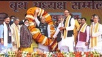 Defence Minister Rajnath Singh being garlanded during 'Booth Adhyaksh Sammelan', in Sitapur district, Thursday. (PTI) Defence Minister Rajnath Singh being garlanded during 'Booth Adhyaksh Sammelan', in Sitapur district, Thursday. (PTI)