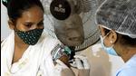 A health worker administers a dose of Covid-19 vaccine to a beneficiary in Patna, Bihar. (Santosh Kumar /HT) A health worker administers a dose of Covid-19 vaccine to a beneficiary in Patna, Bihar. (Santosh Kumar /HT)