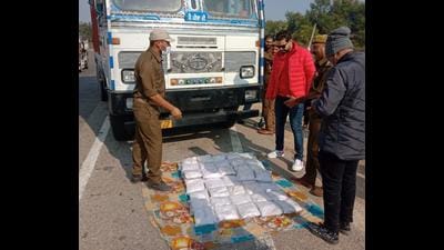 The heroin seized from a truck near Jammu on Thursday. (HT Photo) The heroin seized from a truck near Jammu on Thursday. (HT Photo)