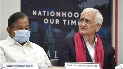 Senior Congress leaders P Chidambaram and Salman Khurshid during the release of Khurshid's book ’Sunrise Over Ayodhya: Nationhood in Our Times’, in New Delhi on November 10. (PTI)