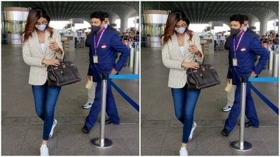 Shilpa Shetty paired a white top and a pair of denims for her airport look. (HT Photos/Varinder Chawla) Shilpa Shetty paired a white top and a pair of denims for her airport look. (HT Photos/Varinder Chawla)