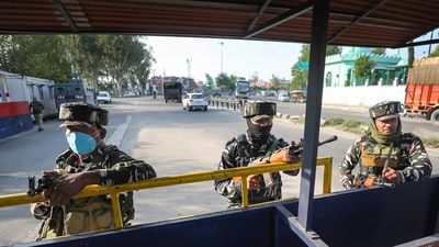 A protest broke out at the site of the gunfight with locals alleging that the forces dragged the three men out the car and shot them. (PTI) A protest broke out at the site of the gunfight with locals alleging that the forces dragged the three men out the car and shot them. (PTI)
