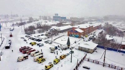 Ambulances and fire trucks parked near the Listvyazhnaya coal mine in the Siberian city of Kemerovo, about 3,000km east of Moscow, Russia, on Thursday. AP