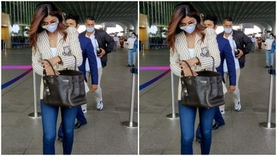 She teamed it with a classic white and black stripped blazer. (HT Photos/Varinder Chawla) She teamed it with a classic white and black stripped blazer. (HT Photos/Varinder Chawla)