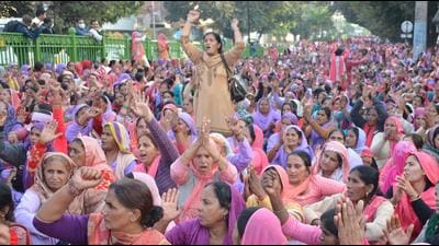 Anganwadi workers protesting in Panchkula on November 24. Two FIRs were registered on Thursday against the protesters. (Sant Arora/HT file)