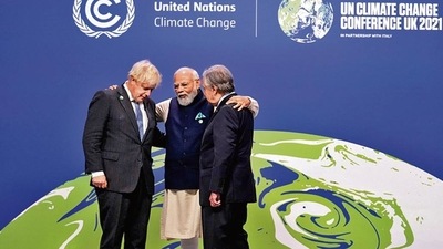 PM Narendra Modi with British PM Boris Johnson and UN Secretary General Antonio Guterres at the Glasgow Summit in Scotland on November 1. PM Narendra Modi with British PM Boris Johnson and UN Secretary General Antonio Guterres at the Glasgow Summit in Scotland on November 1.
