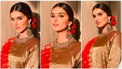 Tara Sutaria is currently busy with the promotions of her upcoming film Tadap where she will be seen alongside Ahan Shetty. The duo was recently in Varanasi to promote their film. Tara opted for a traditional gold linen zari salwar set while Ahan looked dapper in his blue kurta and white pyjama. (Instagram/@spacemuffin27) Tara Sutaria is currently busy with the promotions of her upcoming film Tadap where she will be seen alongside Ahan Shetty. The duo was recently in Varanasi to promote their film. Tara opted for a traditional gold linen zari salwar set while Ahan looked dapper in his blue kurta and white pyjama. (Instagram/@spacemuffin27)