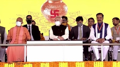 PM Modi and CM Yogi Adityanath on stage for Noida airport inauguration. PM Modi and CM Yogi Adityanath on stage for Noida airport inauguration.