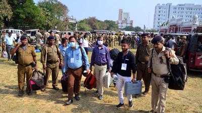 Agartala, Nov 24 (ANI): Polling officials and police personnel carry EVMs as they head towards the polling booth. Counting of votes is to be held on Sunday. The Court also allowed media coverage of the elections in the absence of CCTVs at all polling booths. (ANI) Agartala, Nov 24 (ANI): Polling officials and police personnel carry EVMs as they head towards the polling booth. Counting of votes is to be held on Sunday. The Court also allowed media coverage of the elections in the absence of CCTVs at all polling booths. (ANI)