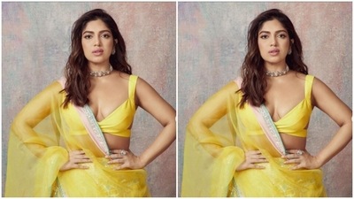 Bhumi decked up in a yellow satin lehenga from the house of Manish Malhotra. (Instagram/@bhumipednekar) Bhumi decked up in a yellow satin lehenga from the house of Manish Malhotra. (Instagram/@bhumipednekar)