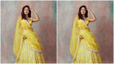 In minimal makeup – silver eyeshadow, black eyeliner, black kohl, mascara-laden eyelashes, drawn eyebrows, contoured cheeks and a shade of nude lipstick – Bhumi aced the wedding look. (Instagram/@bhumipednekar) In minimal makeup – silver eyeshadow, black eyeliner, black kohl, mascara-laden eyelashes, drawn eyebrows, contoured cheeks and a shade of nude lipstick – Bhumi aced the wedding look. (Instagram/@bhumipednekar)