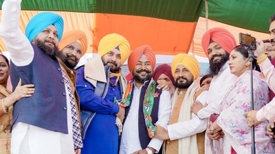 Punjab CM Charanjit Singh Channi and state Congress president Navjot Singh Sidhu inducting Raikot MLA Jagtar Singh Jagga into the party on Thursday. Punjab CM Charanjit Singh Channi and state Congress president Navjot Singh Sidhu inducting Raikot MLA Jagtar Singh Jagga into the party on Thursday.