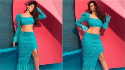 The ensemble is credited to iconic luxury brand Hervé Léger that is ubiquitously known for its unforgettable bandage dresses that celebrate the female form. Wearing a dab of pink lipstick, Nora amplified the glam quotient with a dewy makeup look and was styled by Maneka Harisinghani. (Instagram/norafatehi) The ensemble is credited to iconic luxury brand Hervé Léger that is ubiquitously known for its unforgettable bandage dresses that celebrate the female form. Wearing a dab of pink lipstick, Nora amplified the glam quotient with a dewy makeup look and was styled by Maneka Harisinghani. (Instagram/norafatehi)