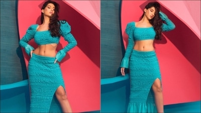 Taking to her social media handle, Nora shared a slew of pictures featuring her in the blue crop top with body hugging skirt and fans were left swooning. (Instagram/norafatehi) Taking to her social media handle, Nora shared a slew of pictures featuring her in the blue crop top with body hugging skirt and fans were left swooning. (Instagram/norafatehi)